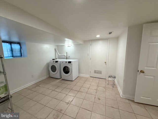 1611 S 28th St, Philadelphia, PA 19145 - washroom featuring light tile patterned floors, independent washer and dryer, and recessed lighting