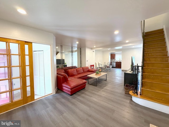 1611 S 28th St, Philadelphia, PA 19145 - living area with wood finished floors, stairway, and recessed lighting