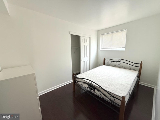 1611 S 28th St, Philadelphia, PA 19145 - bedroom featuring dark wood-style flooring and a closet