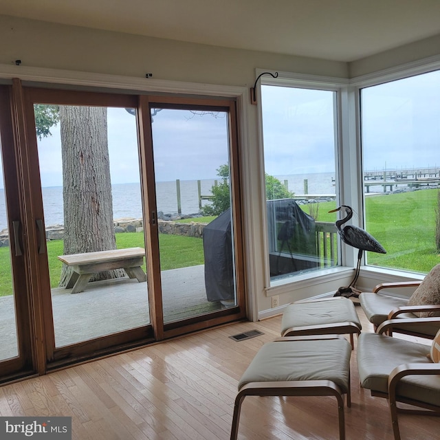 4715 Oak Rd, Shady Side, MD 20764 - sunroom / solarium with a water view and hardwood / wood-style flooring