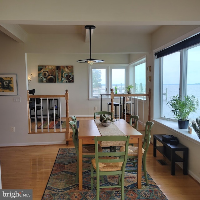 4715 Oak Rd, Shady Side, MD 20764 - dining area with light wood-style floors and baseboards