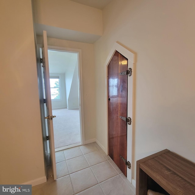 4715 Oak Rd, Shady Side, MD 20764 - hallway with light tile patterned floors and baseboards