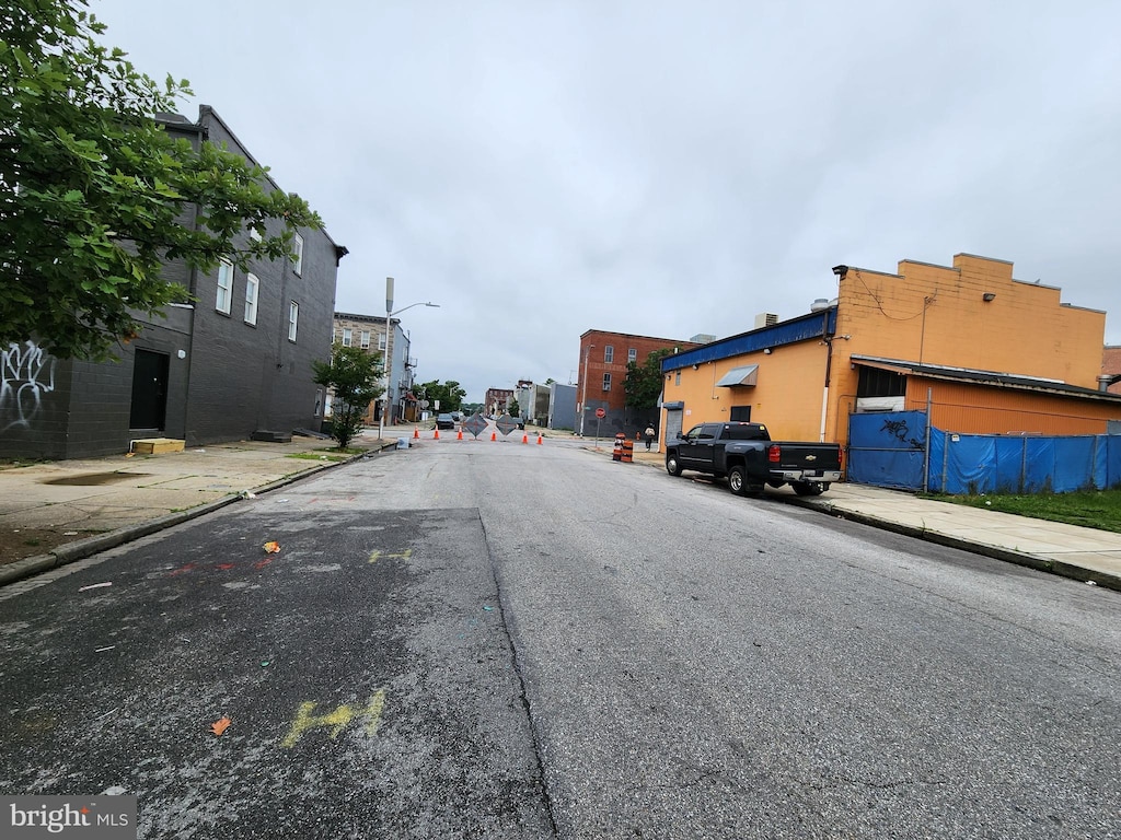 1841 Mchenry St, Baltimore, MD 21223 - view of asphalt street featuring sidewalks, curbs, and street lights