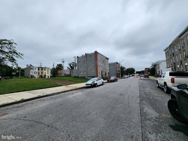 1841 Mchenry St, Baltimore, MD 21223 - view of asphalt road featuring sidewalks, street lighting, curbs, and a residential view