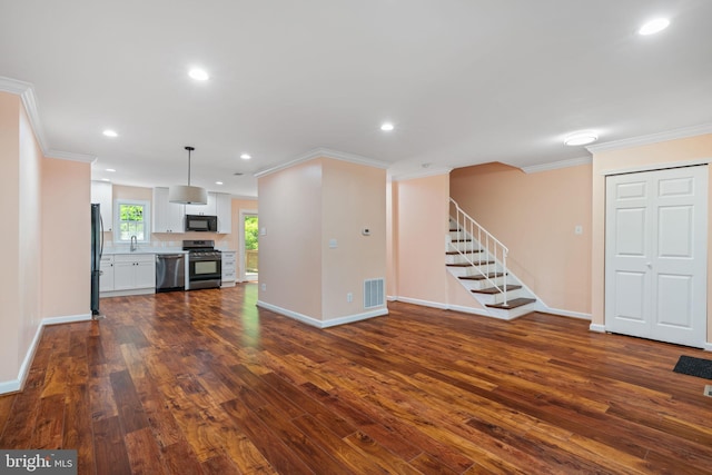 8281 Clifton Farm Ct, Alexandria, VA 22306 - unfurnished living room with dark wood-style flooring, ornamental molding, stairway, and recessed lighting