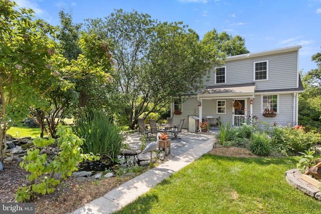 3834 Druck Valley Rd, York, PA 17406 - back of house with a lawn and a patio