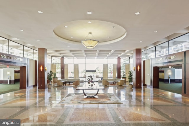 3701 S George Mason Dr Unit 901N, Falls Church, VA 22041 - lobby with a towering ceiling, recessed lighting, and floor to ceiling windows