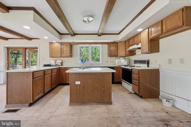 249 Mattson Rd, Garnet Valley, PA 19060 - kitchen featuring white appliances, under cabinet range hood, beam ceiling, light countertops, and a peninsula