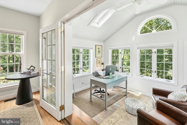 2109 Main St, Bethlehem, PA 18017 - home office featuring healthy amount of natural light, ceiling fan, light wood-style flooring, a skylight, and high vaulted ceiling