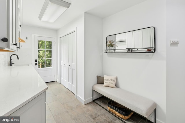 2109 Main St, Bethlehem, PA 18017 - mudroom with a sink and baseboards