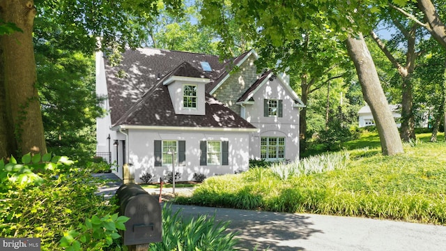 2109 Main St, Bethlehem, PA 18017 - view of front of property with stucco siding, a chimney, and a shingled roof