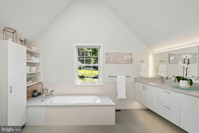 2109 Main St, Bethlehem, PA 18017 - bathroom with vanity, a garden tub, lofted ceiling, and tile patterned flooring