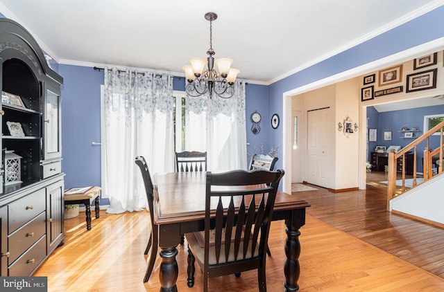 21 Black Bass, Fairfield, PA 17320 - dining area featuring a chandelier, light wood-style floors, crown molding, and stairway
