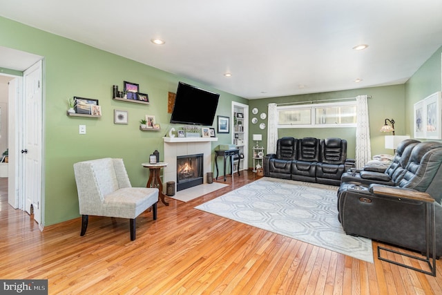 21 Black Bass, Fairfield, PA 17320 - living room featuring wood-type flooring, a tiled fireplace, and recessed lighting