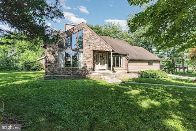 21 Black Bass, Fairfield, PA 17320 - view of front of home with a chimney, stone siding, and a front lawn