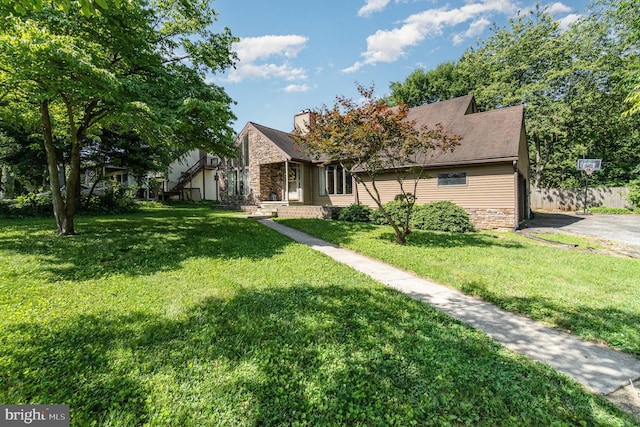 21 Black Bass, Fairfield, PA 17320 - view of front of home with stone siding, a front lawn, and a chimney