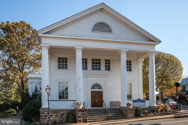 3221 Adams Ct, Fairfax, VA 22030 - greek revival inspired property with covered porch