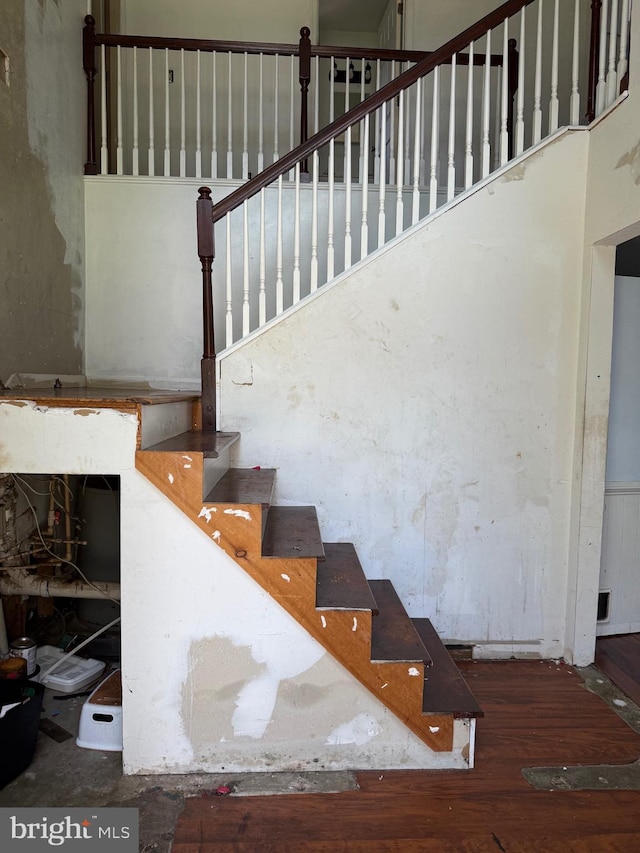 4 Brook Ramble Ln, Townsend, DE 19734 - stairway with wood finished floors and a towering ceiling