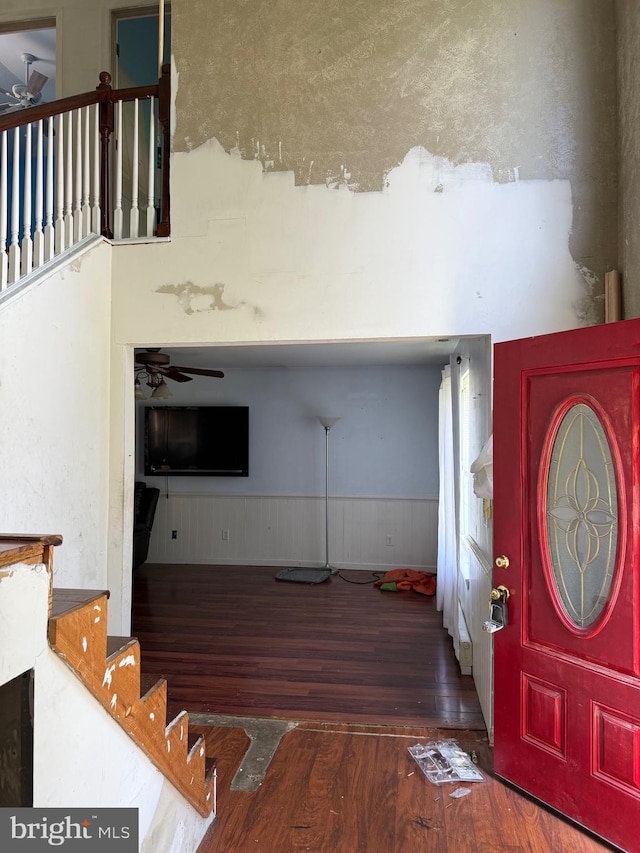 4 Brook Ramble Ln, Townsend, DE 19734 - entryway featuring ceiling fan, wood finished floors, a wainscoted wall, and stairs