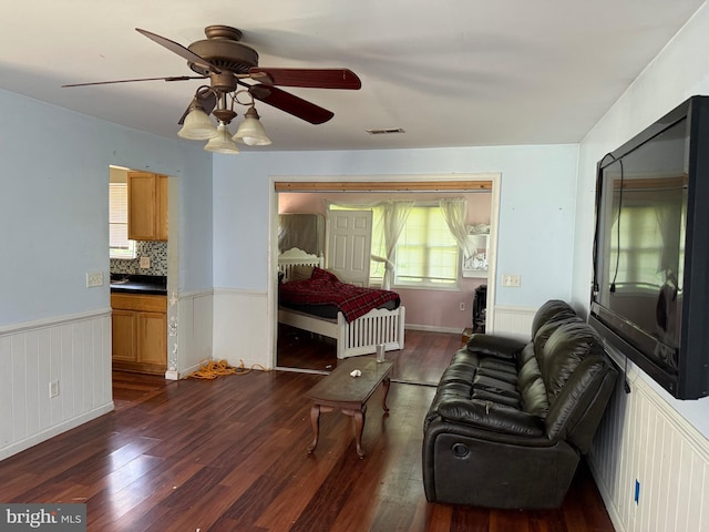 4 Brook Ramble Ln, Townsend, DE 19734 - bedroom with dark wood-type flooring, wainscoting, and ceiling fan