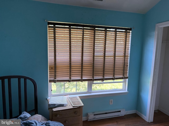 4 Brook Ramble Ln, Townsend, DE 19734 - bedroom featuring a baseboard radiator and wood finished floors