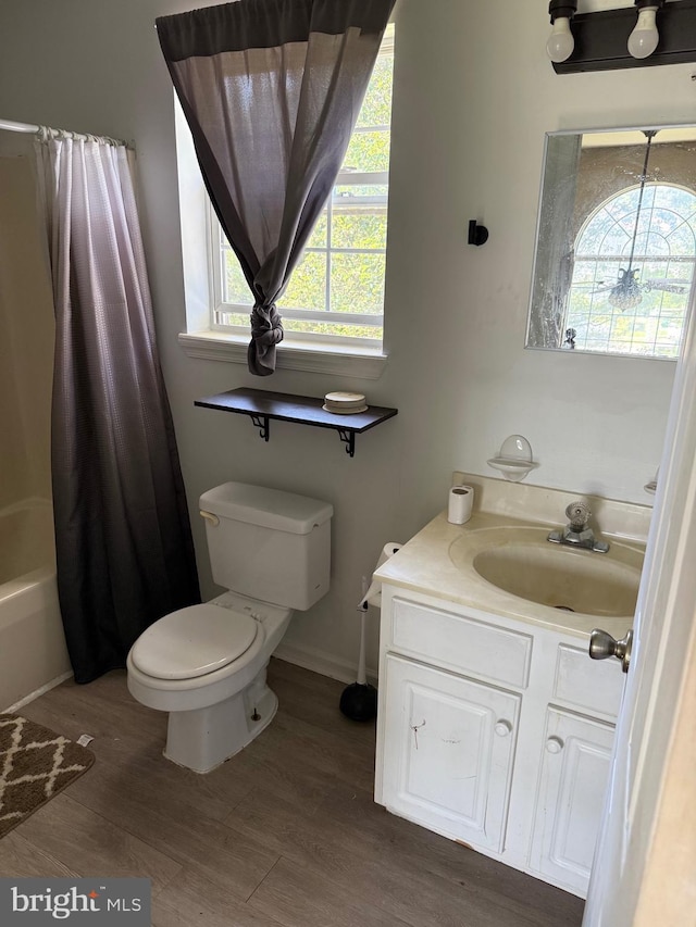 4 Brook Ramble Ln, Townsend, DE 19734 - bathroom featuring vanity, wood finished floors, and shower / tub combo with curtain