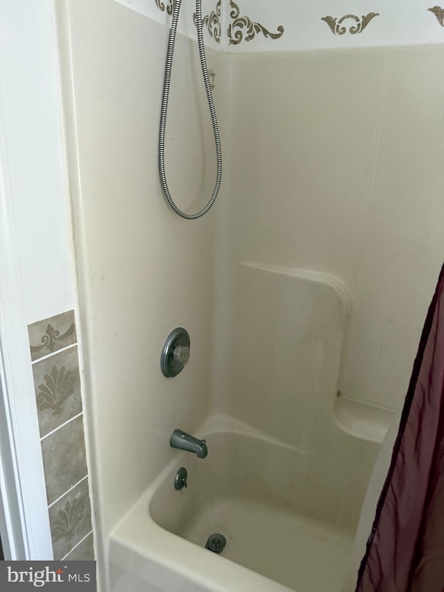 4 Brook Ramble Ln, Townsend, DE 19734 - bathroom with shower / tub combo with curtain