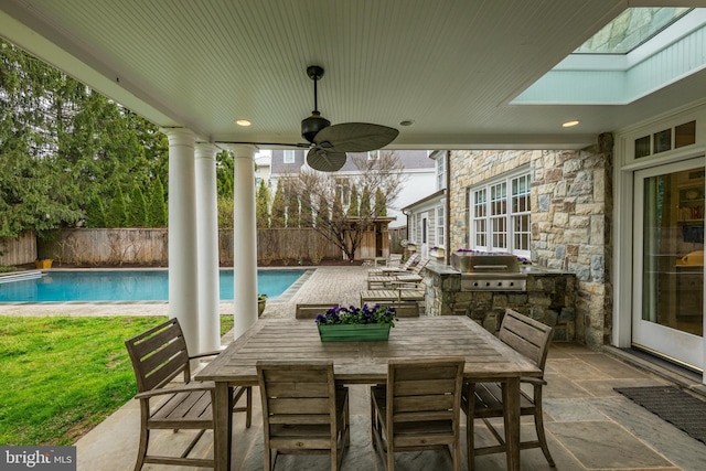 2950 Chain Bridge Rd NW, Washington, DC 20016 - fenced backyard with an outdoor kitchen, a patio, and ceiling fan