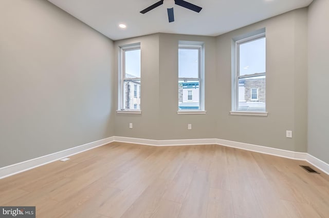 3621 Chestnut Ave, Baltimore, MD 21211 - empty room with light wood-style floors, ceiling fan, and recessed lighting