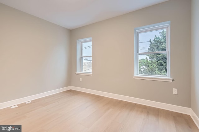 3621 Chestnut Ave, Baltimore, MD 21211 - unfurnished room featuring baseboards and light wood-style flooring