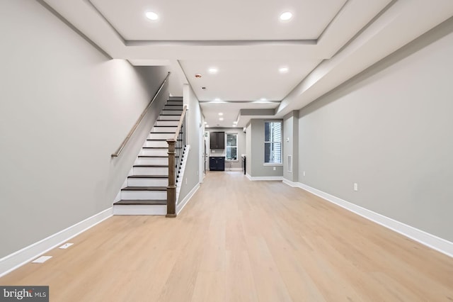 3621 Chestnut Ave, Baltimore, MD 21211 - unfurnished living room with stairway, light wood-style flooring, and recessed lighting