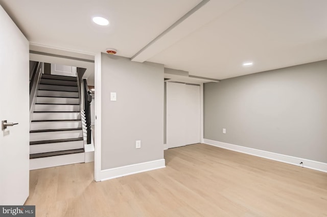 3621 Chestnut Ave, Baltimore, MD 21211 - finished basement with wood finished floors, recessed lighting, and stairway