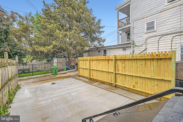3621 Chestnut Ave, Baltimore, MD 21211 - fenced backyard with a patio and a storage shed