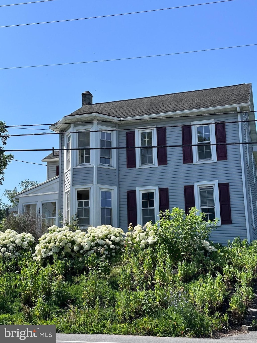 4821 Baltimore Pike, Littlestown, PA 17340 - view of front facade with a chimney