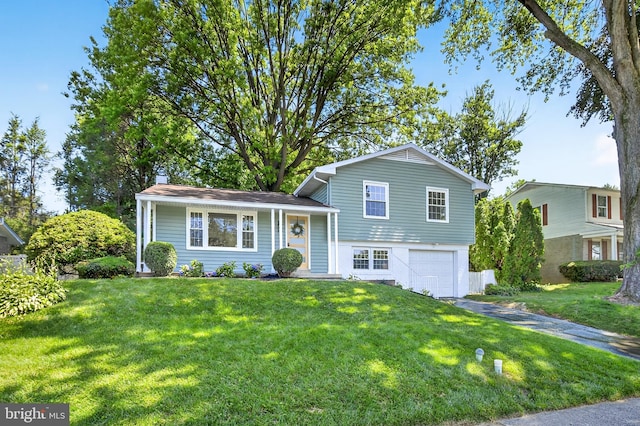 341 Ashford Dr, Lancaster, PA 17601 - split level home with a garage, a front yard, and driveway
