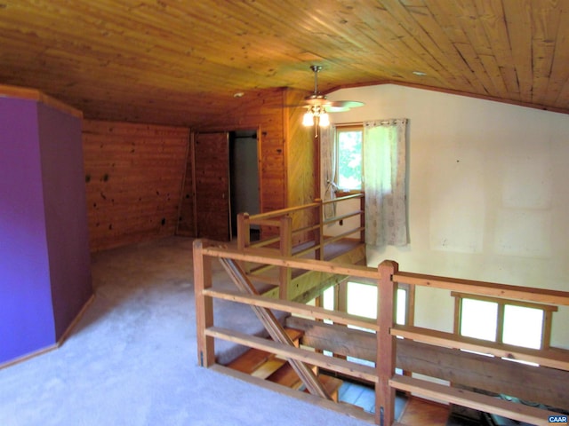 506 Peters Hollow Rd, Monroe, VA 24574 - unfurnished room with wood ceiling, lofted ceiling, ceiling fan, wood walls, and carpet floors