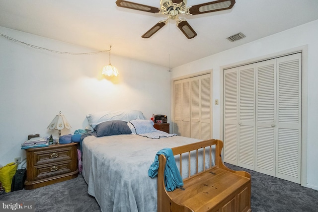 2057 Grove St, Allentown, PA 18104 - bedroom with two closets, dark carpet, and a ceiling fan
