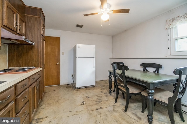 2057 Grove St, Allentown, PA 18104 - dining area featuring a ceiling fan and concrete flooring