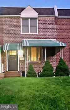 43 Briarcliffe Rd, Glenolden, PA 19036 - back of house featuring brick siding and a lawn