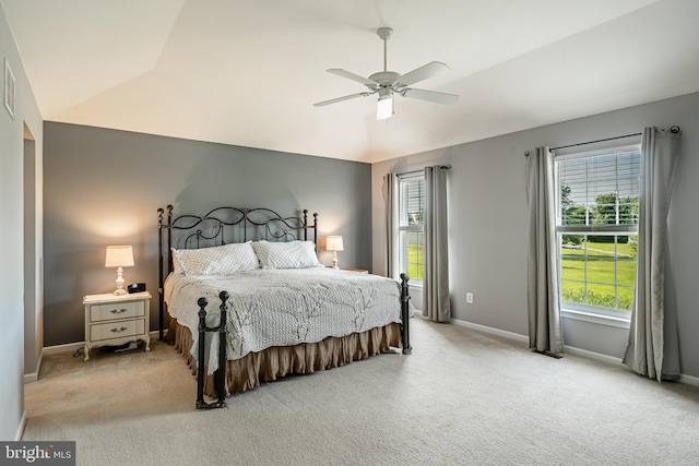 14 Burk Rd, Cochranville, PA 19330 - bedroom with light colored carpet, multiple windows, vaulted ceiling, and a ceiling fan