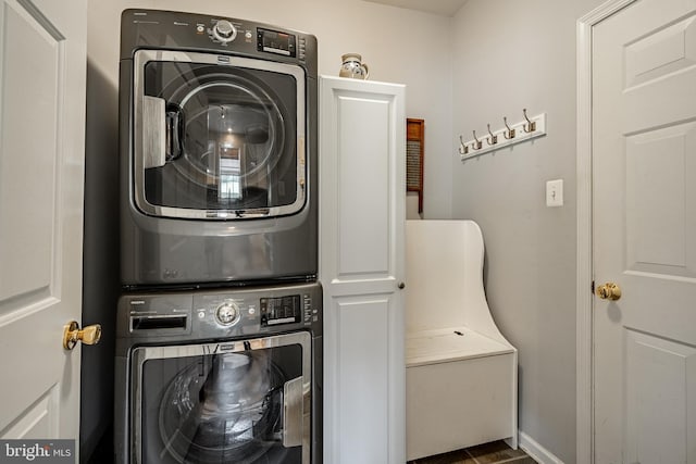 14 Burk Rd, Cochranville, PA 19330 - laundry room featuring stacked washer / dryer and cabinet space