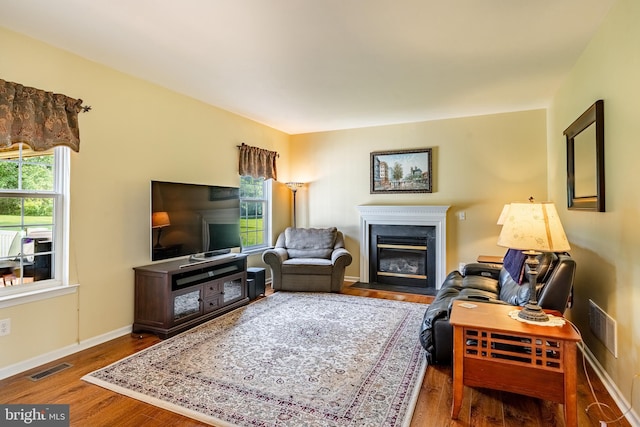 14 Burk Rd, Cochranville, PA 19330 - living area with wood finished floors and a fireplace with flush hearth