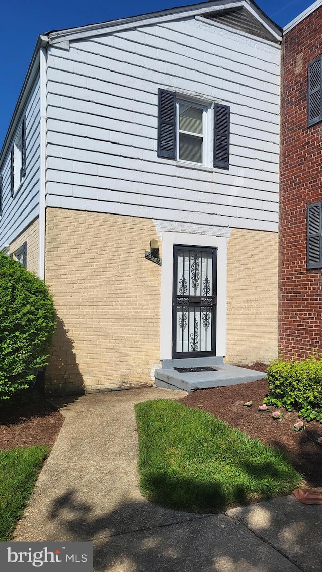 2510 Iverson St Unit 2510, Temple Hills, MD 20748 - doorway to property featuring brick siding