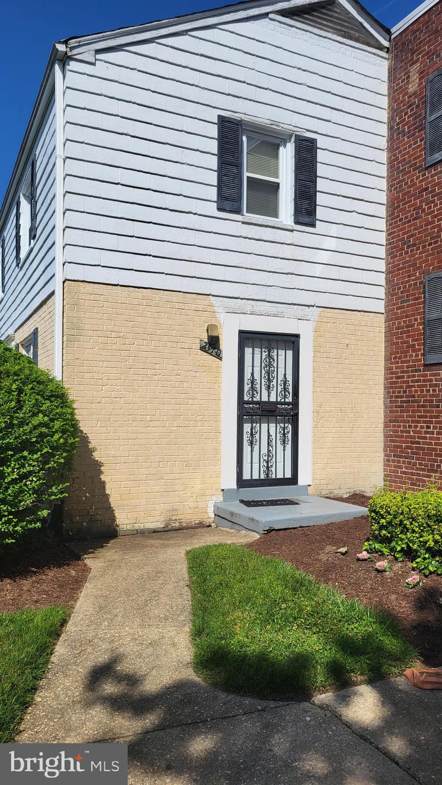2510 Iverson St Unit 2510, Temple Hills, MD 20748 - doorway to property featuring brick siding
