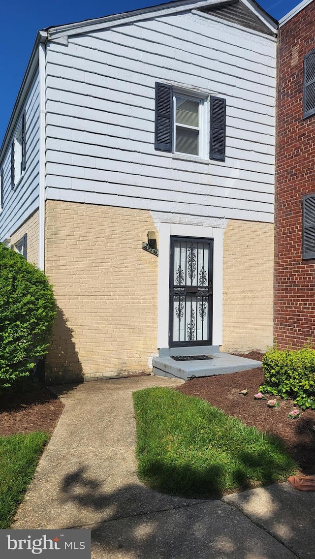2510 Iverson St Unit 2510, Temple Hills, MD 20748 - doorway to property featuring brick siding