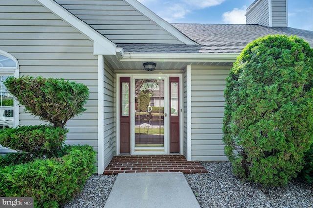 3217 Garfield Ave, Reading, PA 19605 - entrance to property featuring roof with shingles and a chimney