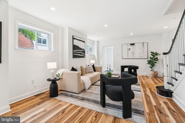 3827 Marshall Rd, Drexel Hill, PA 19026 - living area with stairway, wood finished floors, healthy amount of natural light, and recessed lighting