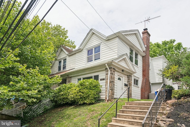 3827 Marshall Rd, Drexel Hill, PA 19026 - view of front of home with a chimney and a front lawn