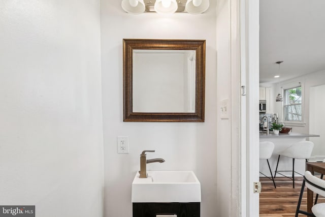 3827 Marshall Rd, Drexel Hill, PA 19026 - bathroom with a sink and wood finished floors