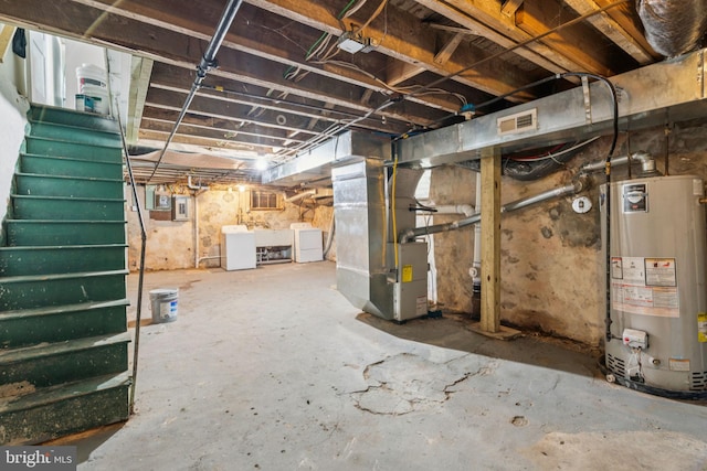3827 Marshall Rd, Drexel Hill, PA 19026 - unfinished basement featuring gas water heater, washer and clothes dryer, heating unit, stairs, and electric panel